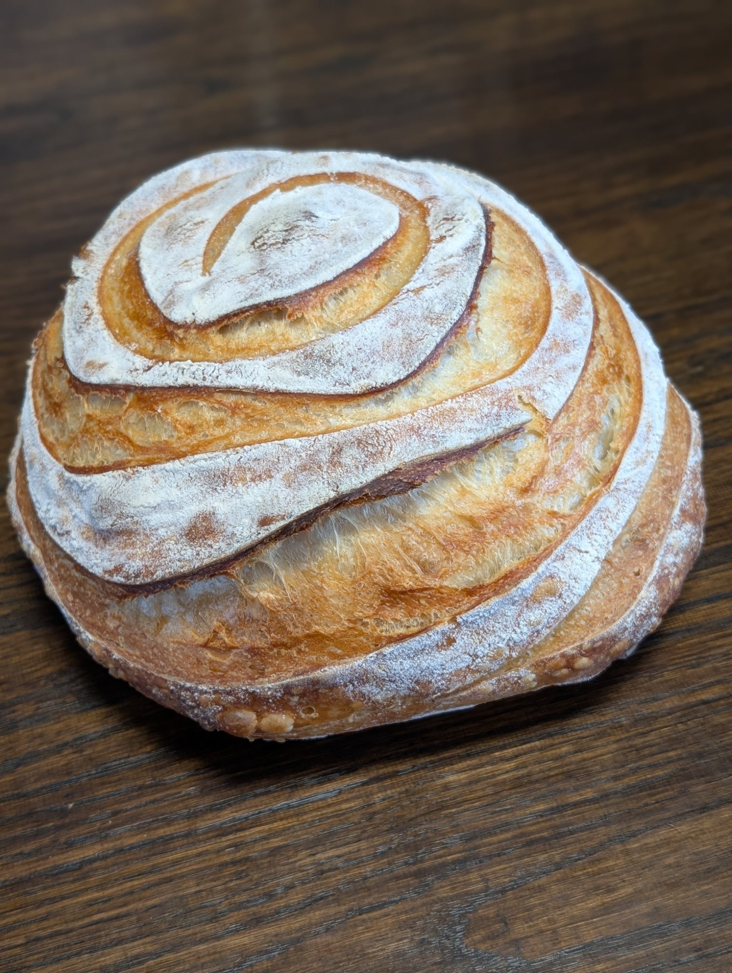 Spiral scored sourdough with flour dusting